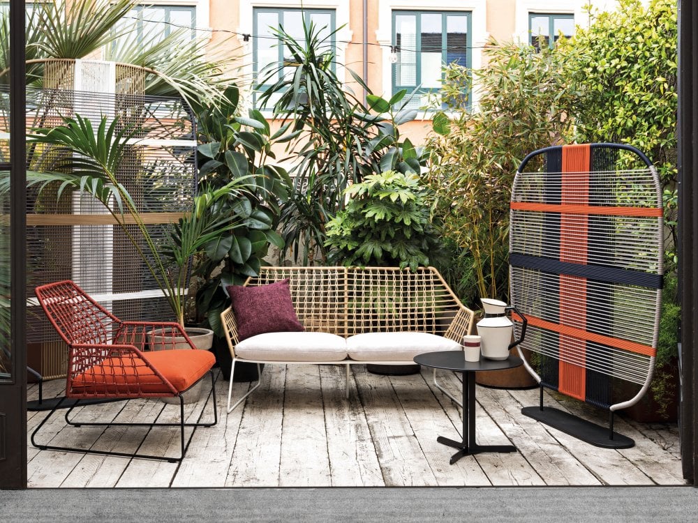 Designed by Marco Zito, the Shade of Venice dividers are inspired by the Venetian islands and their local glow, are created with a magical colorful weave of nautical cords. From the white stone of Giudecca to the colors of the vegetables that grow in the garden patches of Venice’s Sant’Erasmo, four variations were born: Murano, Burano, Giudecca and Sant’Erasmo. The light blue and green colors of Murano play in the threads of the divider’s weave, whilst the bright tonalities and contrasts of the Burano design reflect the colorful houses of the island in orange and blue. The design plays with positive and negative space, creating a peek-a-boo effect subtly revealing the surroundings beyond. 